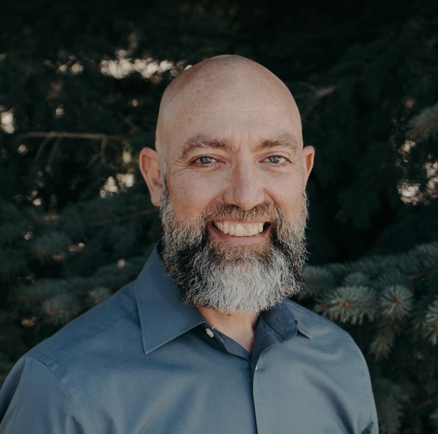 Nathan Hope, deacon at Emmaus Road Church in Bozeman, MT, smiling